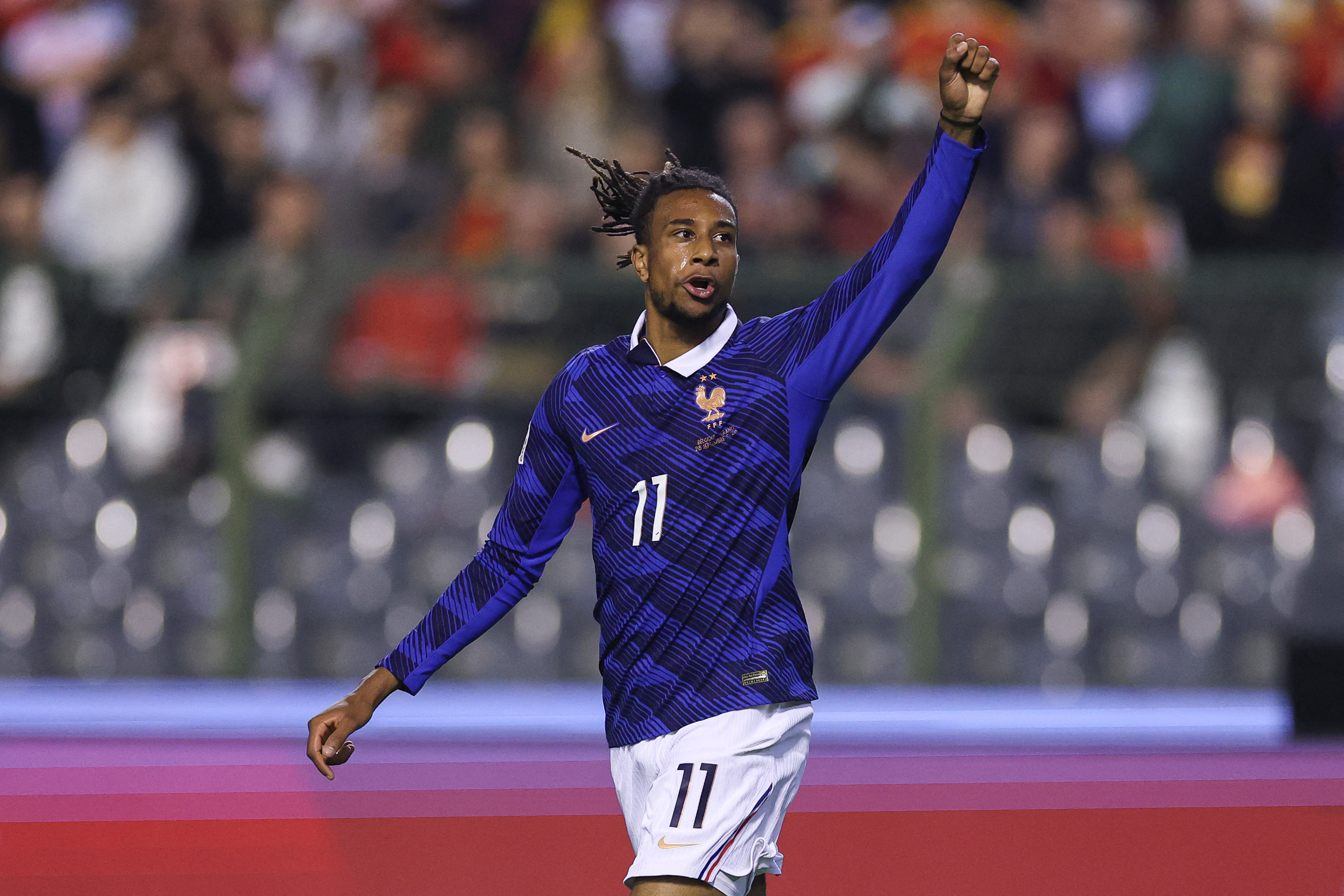 France's midfielder #11 Michael Olise celebrates scoring his team's first goal during the UEFA Nations League Group A1 football match between Belgium and France at King Baudouin Stadium in Brussels on September 28, 2026.