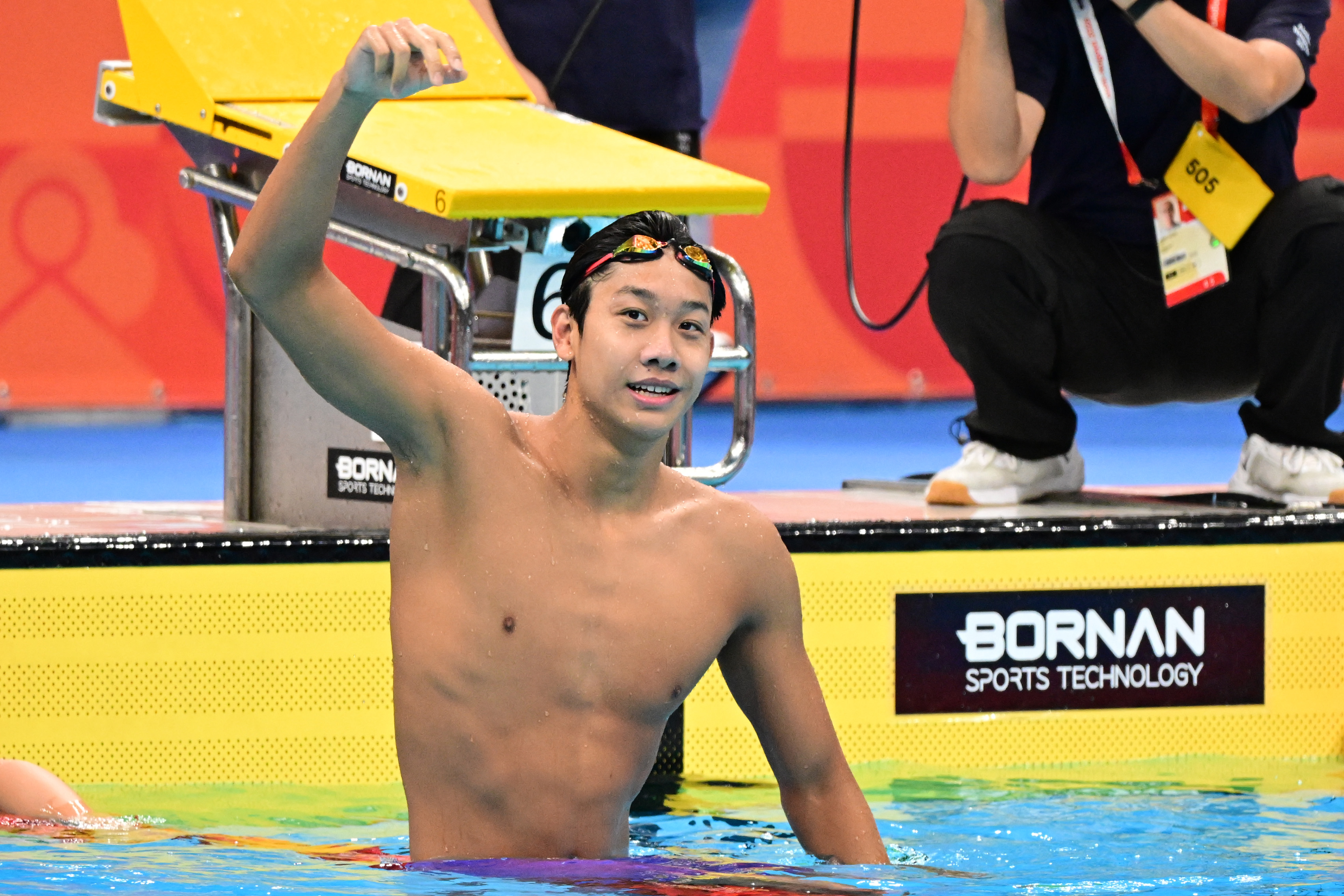 TOKYO, JAPAN - SEPTEMBER 25: Zhanshuo Zhang of China celebrates winning the gold medal after competing in the Swimming Men's 400m Freestyle Final on day six of the 20th Asian Games Aichi-Nagoya at Tokyo Aquatics Centre on September 25, 2026 in Tokyo, Japan. (Photo by Atsushi Tomura/Getty Images)