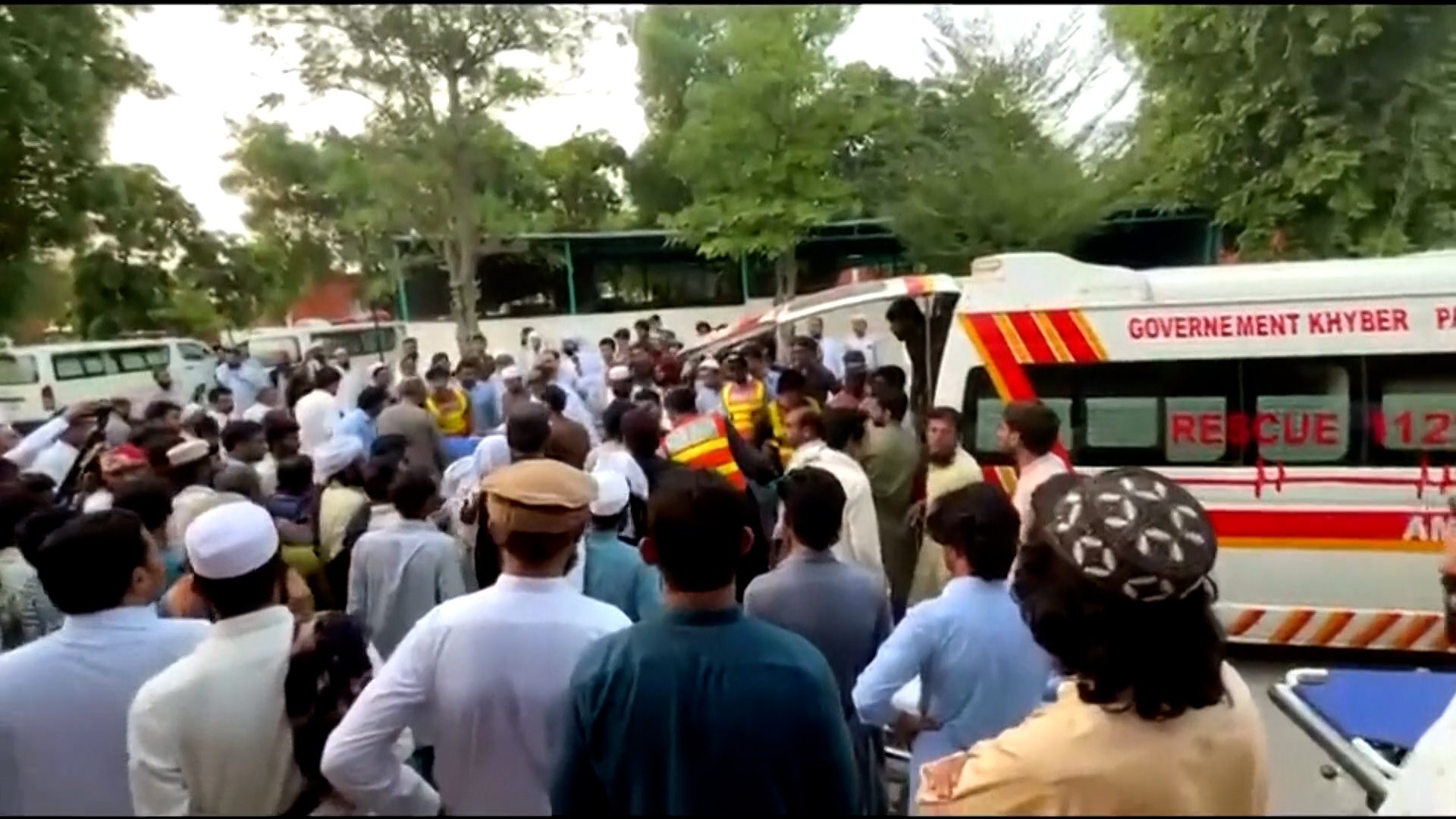 People gathered around an ambulance