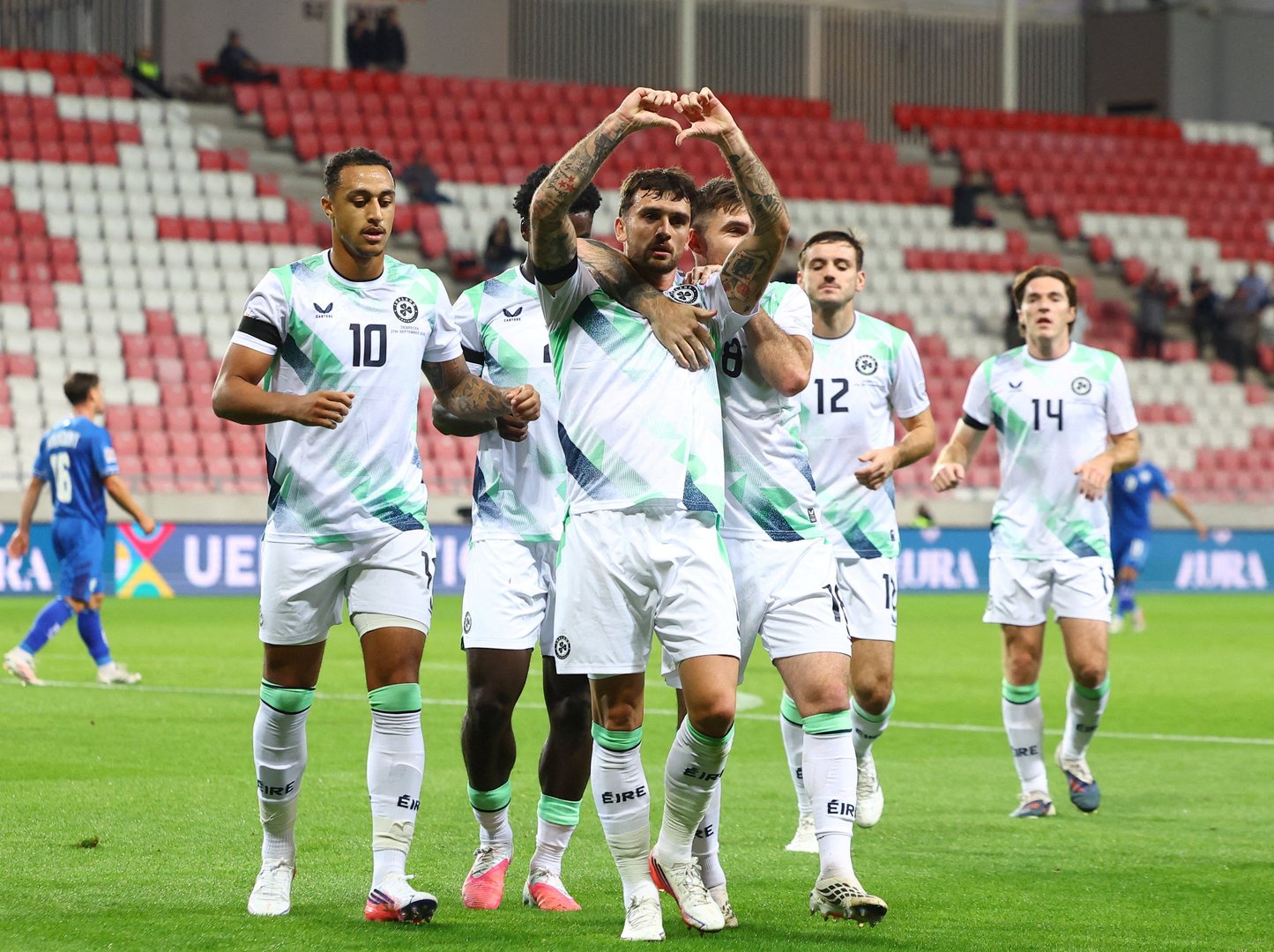 Republic of Ireland's Troy Parrott celebrates scoring their first goal with teammates at the Nagyerdei Stadion, Debrecen, Hungary September 27, 2026 [REUTERS/Bernadett Szabo]