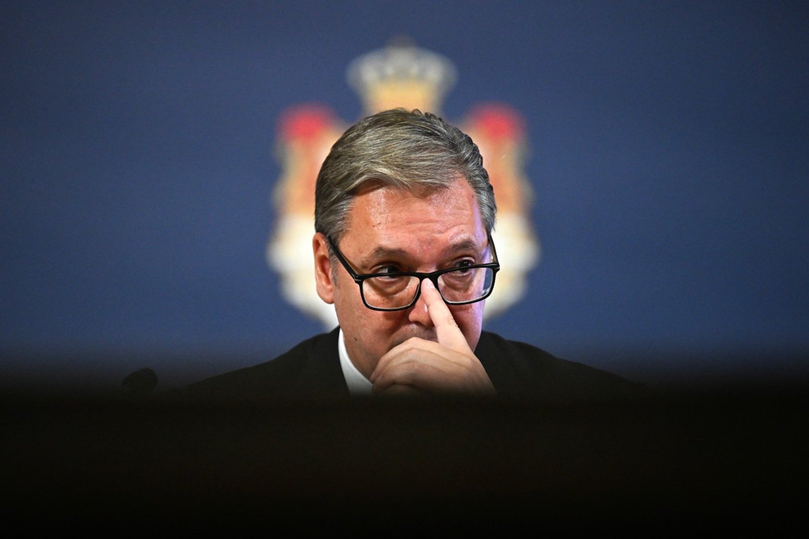 Serbia's President Aleksandar Vucic gestures as he delivers his resignation speech during a press conference at the Presidential Palace in Belgrade on September 27, 2026. [OLIVER BUNIC / AFP]