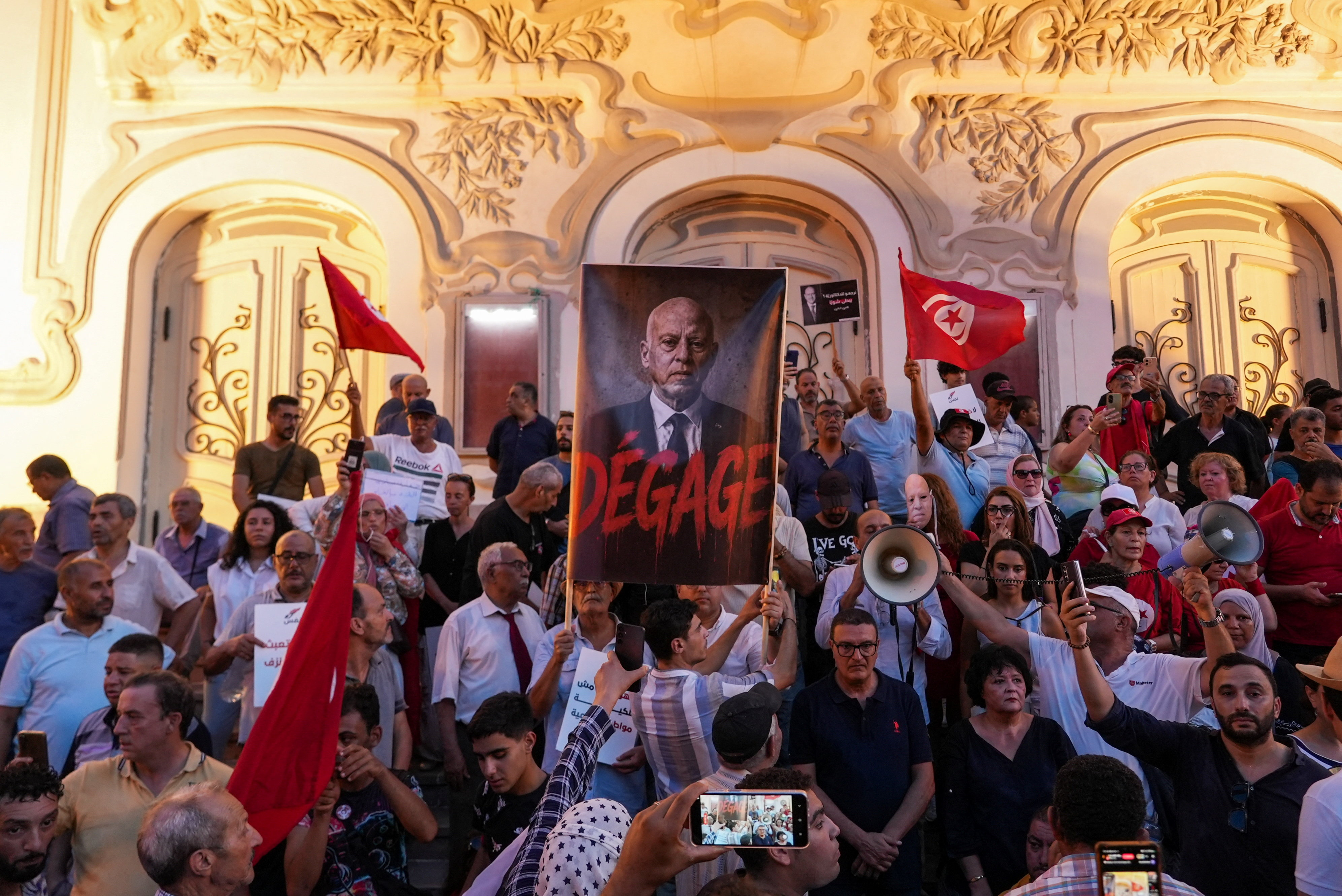 Tunisians protest against President Kais Saied, demanding the restoration of democracy and calling for the release of jailed activists and journalists amid a worsening economic and social crisis, in Tunis, Tunisia, August 20, 2026. REUTERS/Jihed Abidellaoui