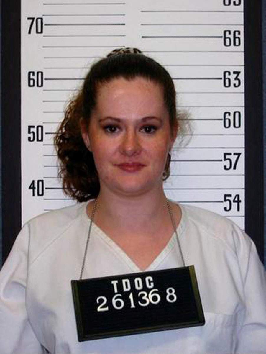 FILE PHOTO: Christa Gail Pike, 36, the only woman on Tennessee's Death Row, is pictured in this 2004 Tennessee Department of Correction booking photograph obtained by Reuters March 22, 2012. A prison guard and the boyfriend of Pike, have been charged in connection with a plan to break her out of the Tennessee Prison for Women in Nashville. A grand jury indicted 23-year-old Justin Heflin, previously a correctional officer at the Tennessee Prison for Women, on one count of bribery, one count of official misconduct, one count of conspiracy to commit escape and one count of facilitation to commit escape. Donald Kohut, 34, an acquaintance of Pike who frequently visited her in prison, was indicted on one count of bribery and one count of conspiracy to commit escape. REUTERS/Tennessee Department of Correction/Handout (UNITED STATES - Tags: CRIME LAW SOCIETY) FOR EDITORIAL USE ONLY. NOT FOR SALE FOR MARKETING OR ADVERTISING CAMPAIGNS. THIS IMAGE HAS BEEN SUPPLIED BY A THIRD PARTY. IT IS DISTRIBUTED, EXACTLY AS RECEIVED BY REUTERS, AS A SERVICE TO CLIENTS/File Photo