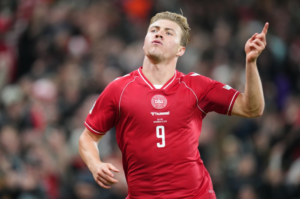 Rasmus Hoejlund of Denmark celebrates after scoring the 2-2 equalizing goal during the UEFA Nations League match Denmark against Portugal