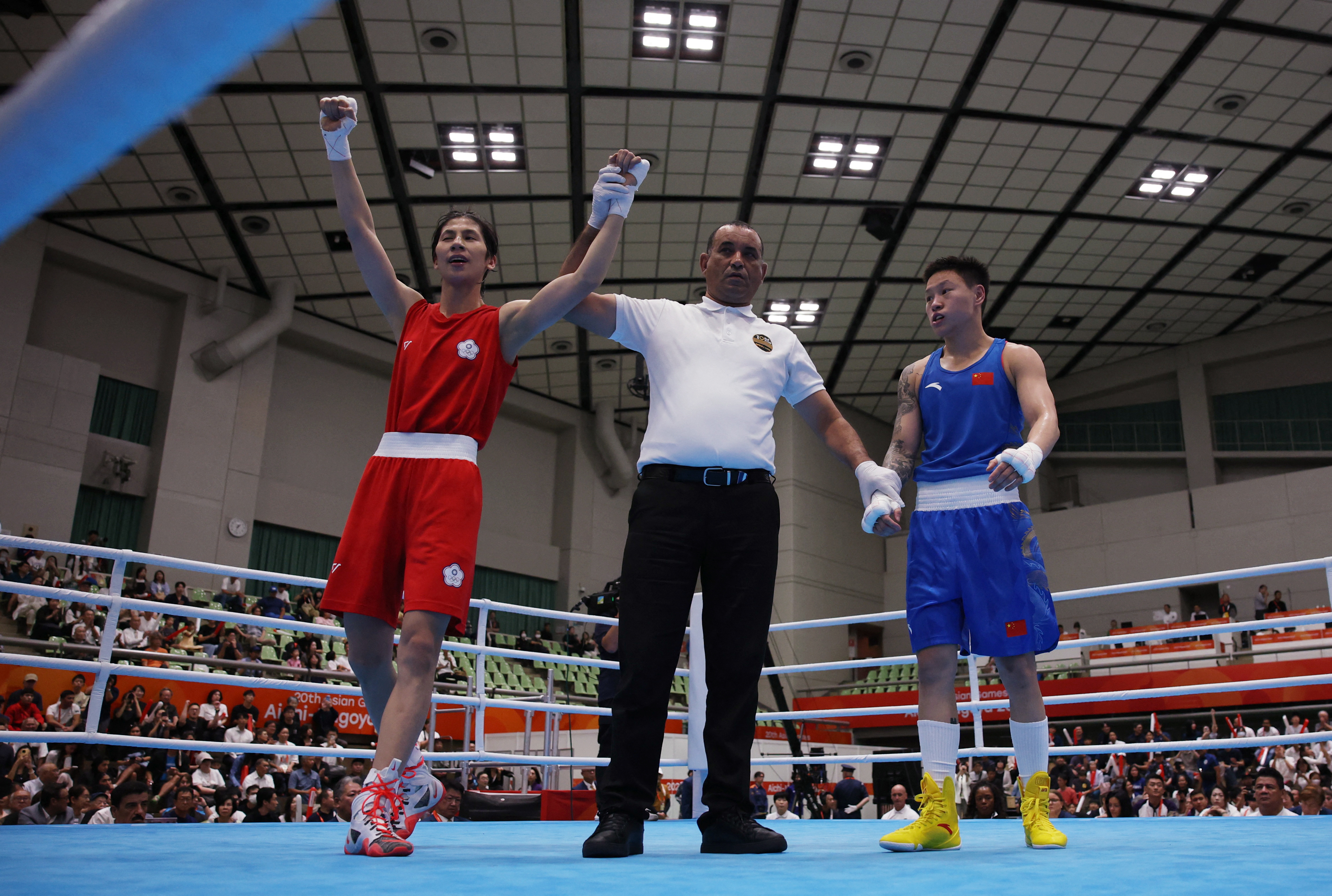 Asian Games - Aichi-Nagoya 2026 - Boxing - Nishio City General Gymnasium, Nishio, Japan - October 2, 2026 Taiwan's Lin Yu-ting celebrates after winning against China's Yang Chengyu in the women's 60kg final REUTERS/Andrew Boyers
