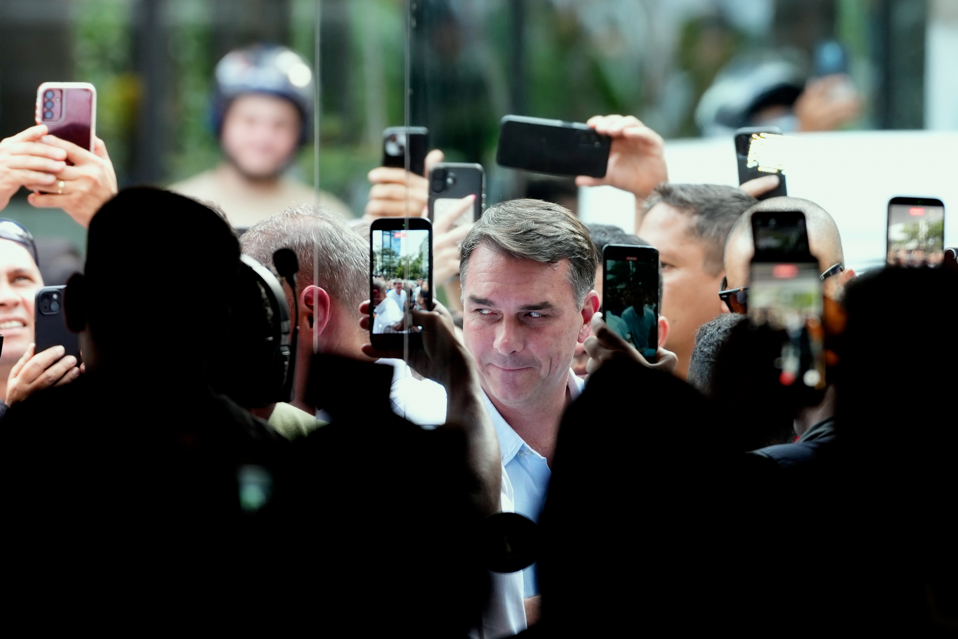 Opposition presidential candidate Sen. Flavio Bolsonaro arrives to meet with jiu-jitsu black belts as part of his campaign ahead of general elections in Sao Paulo, Tuesday, Sept. 29, 2026. (AP Photo/Andre Penner)